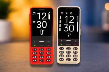 BlindShell Classic 2 in red and BlindShell Classic 3 in Golden Sand displayed side by side from the front against a softly blurred yellow and blue background. Both phones feature large high-contrast displays, tactile physical keypads, and clearly distinguishable call and navigation buttons.